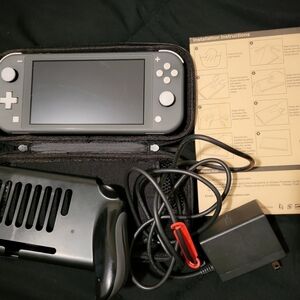 Nintendo Switch Lite with accessories excellent used condition!